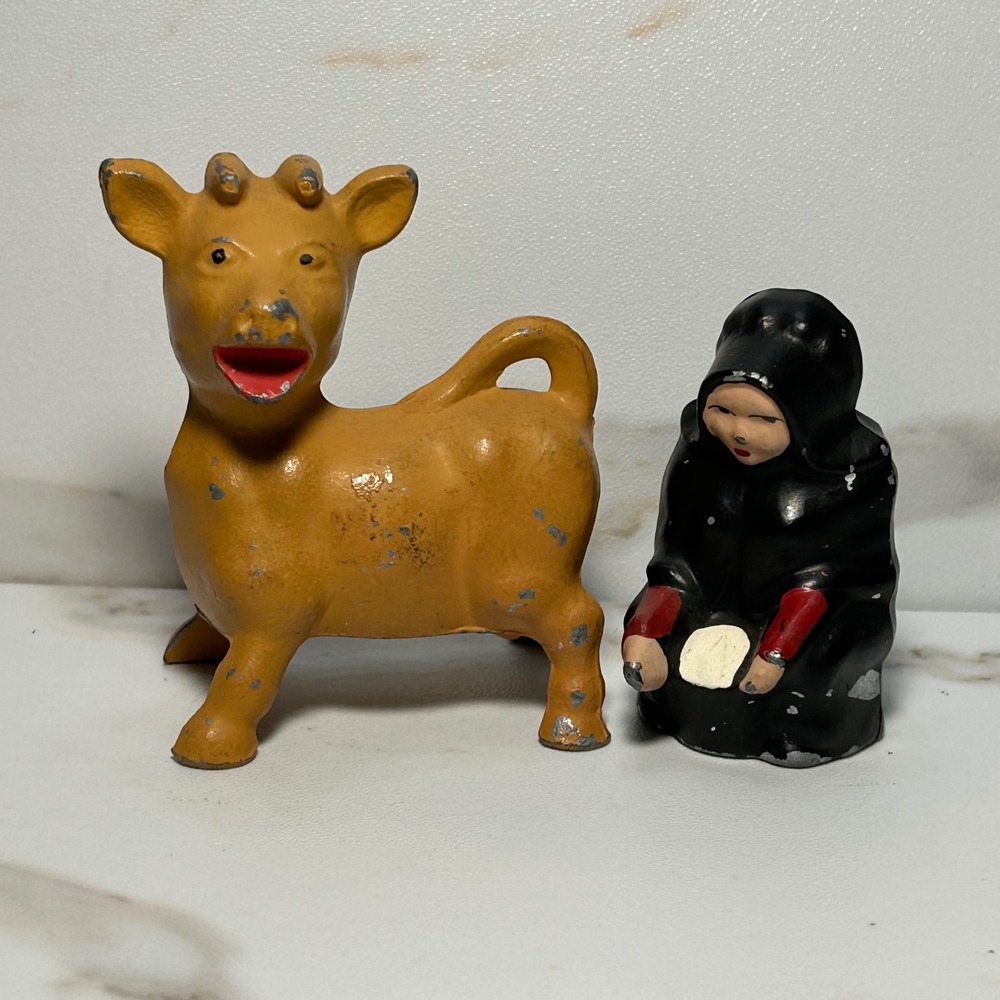 Vintage Cast Iron Cow and Milkmaid Salt and Pepper Shakers Set Yellow Black
